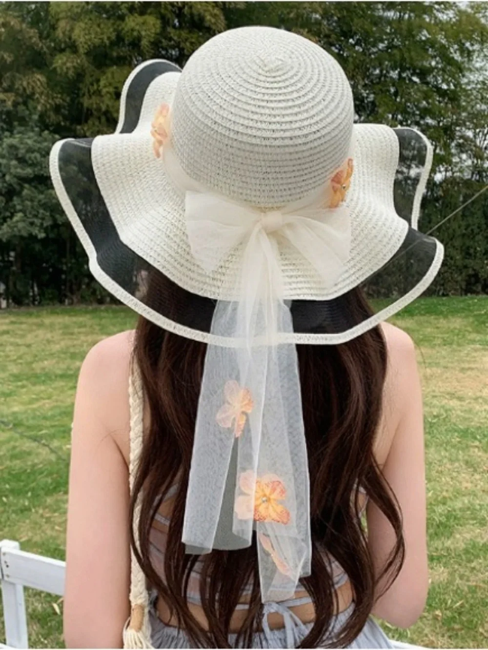Elegant Cream Wide-Brim Sun Hat with Tulle Bow and Floral Accents